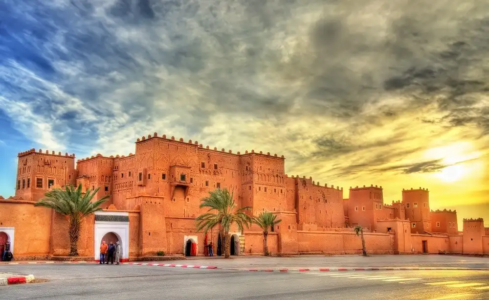 Morocco tours from Italy visiting Taourirt Kasbah in Ouarzazate at sunset