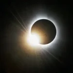 Morocco Solar Eclipse Tour 2028 – diamond ring effect during totality, with sunlight bursting around the moon's silhouette against a black sky.