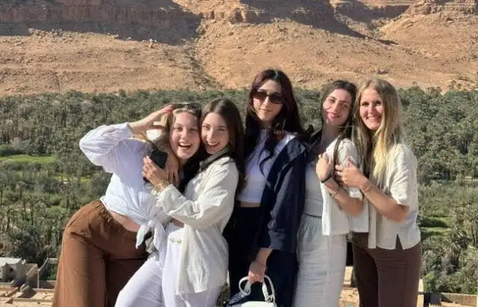 Is Morocco safe for American students? Group photo in the desert valley