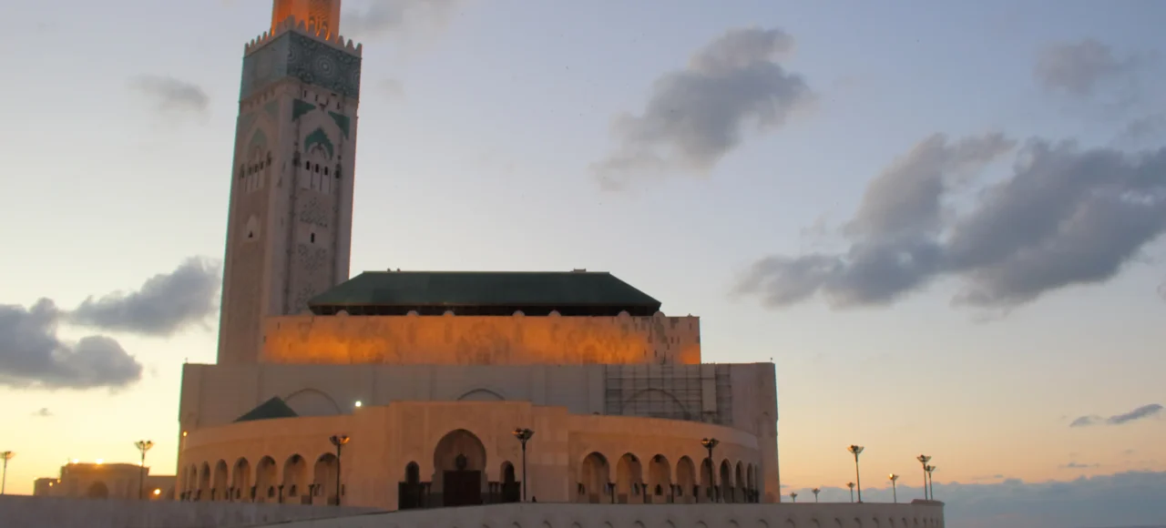 16 Days Morocco Tour From Casablanca – Hassan II Mosque Hassan II Mosque in Casablanca at sunset, the starting point of the 16 Days Morocco Tour From Casablanca